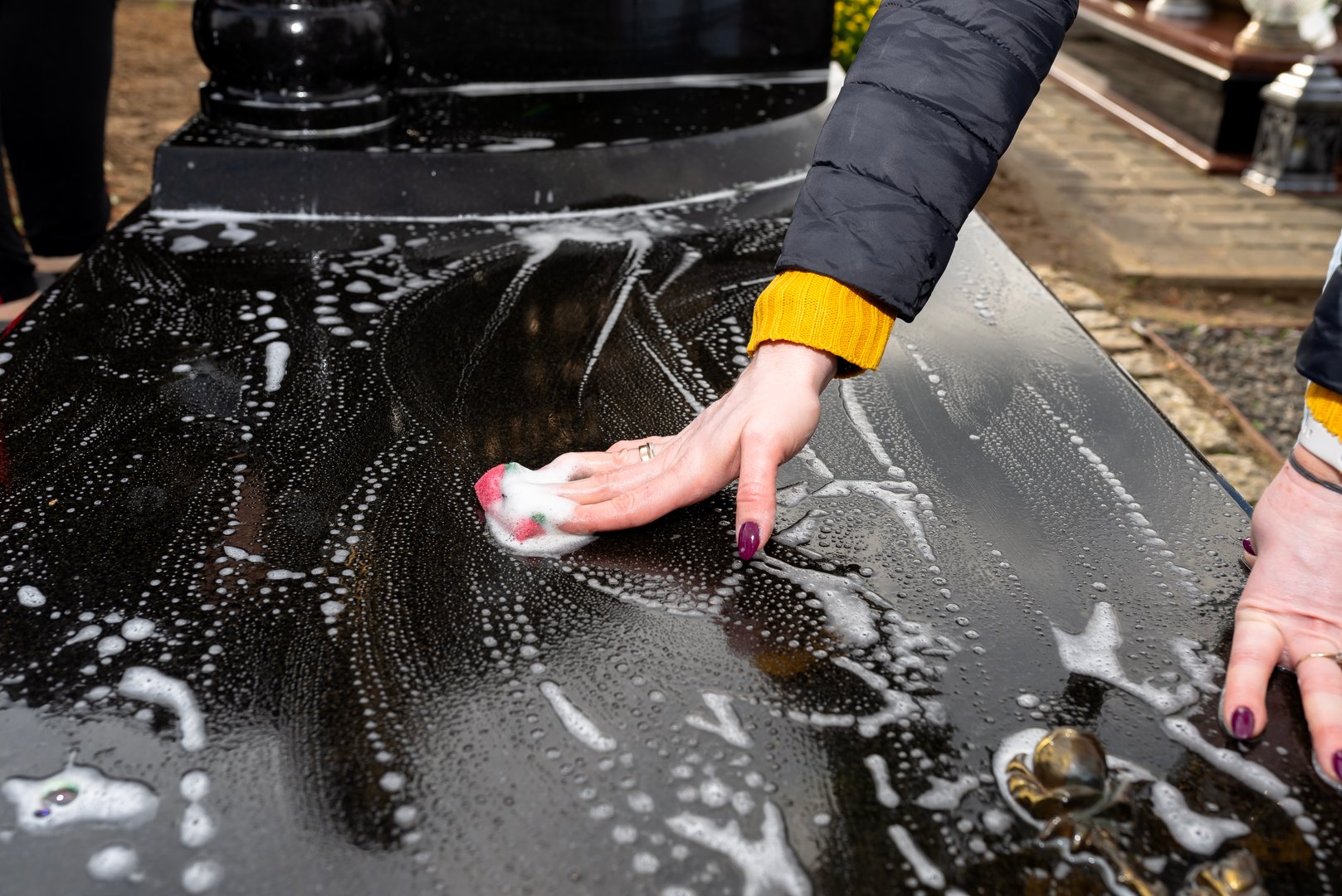 Cleaning a gravestone